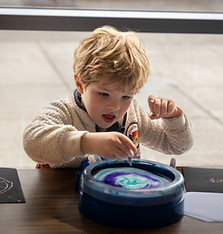Boy doing spin art